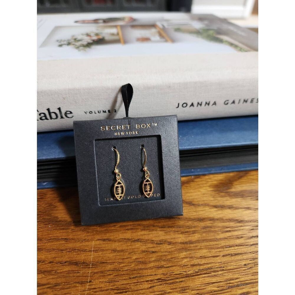 Secret Box 14K gold dipped football earrings